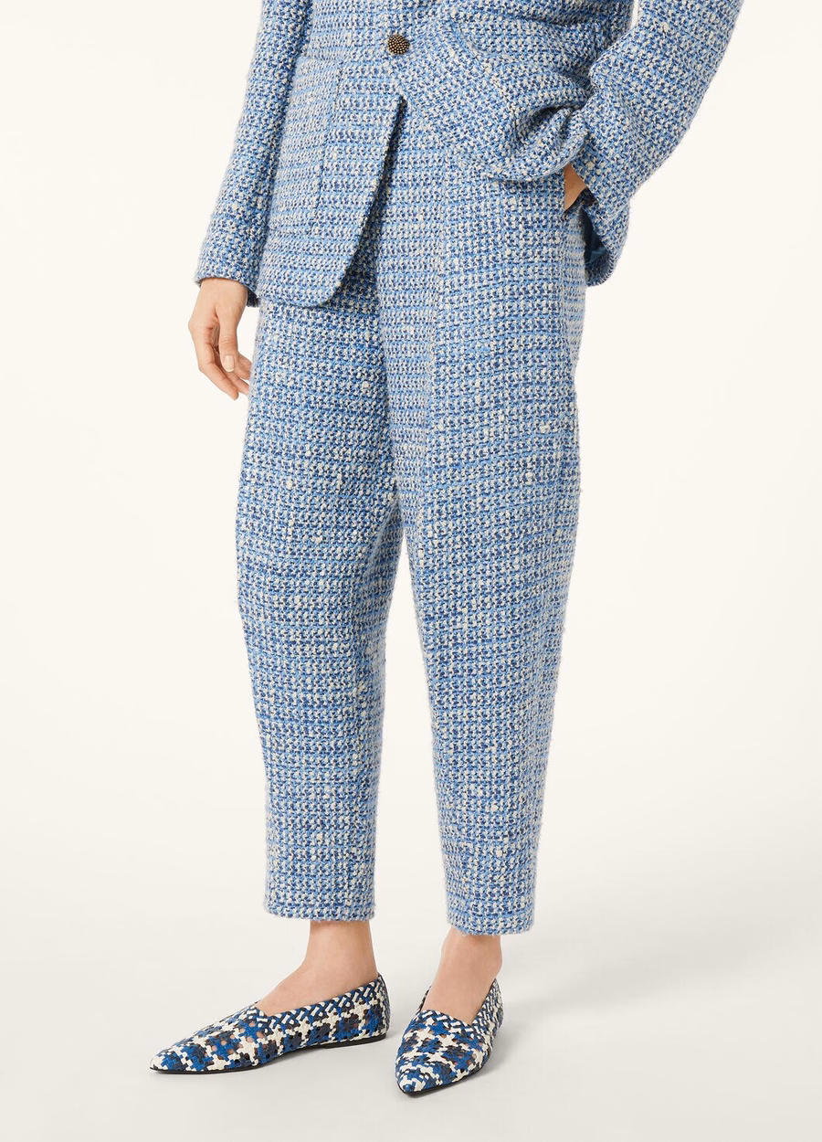 Pantalones Dan de seda y lana virgen tejida en color azul.
